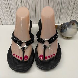 Women’s Sketchers Black Wedge Sandals Size 9. Cute details on shoes, see images.